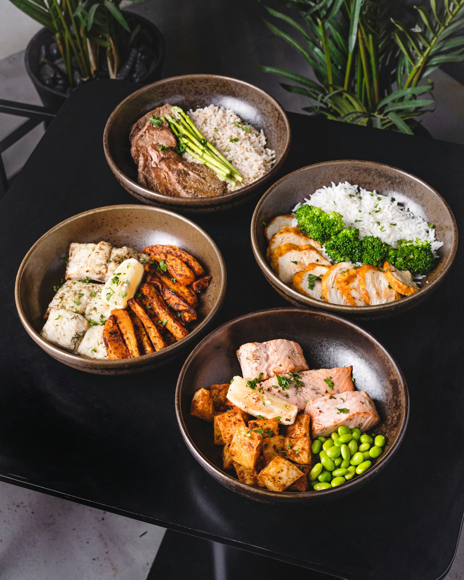 Catering platters with rice, grilled meats and vegetables
